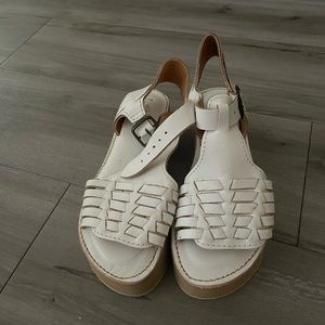 White platform sandals